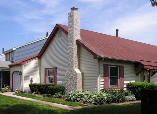 Кирпичная труба на крыше. Какие бывают кирпичные дымоходы?